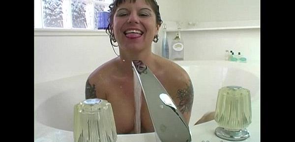  Tattooed MILF Randy Masturbating In The Bath Tube